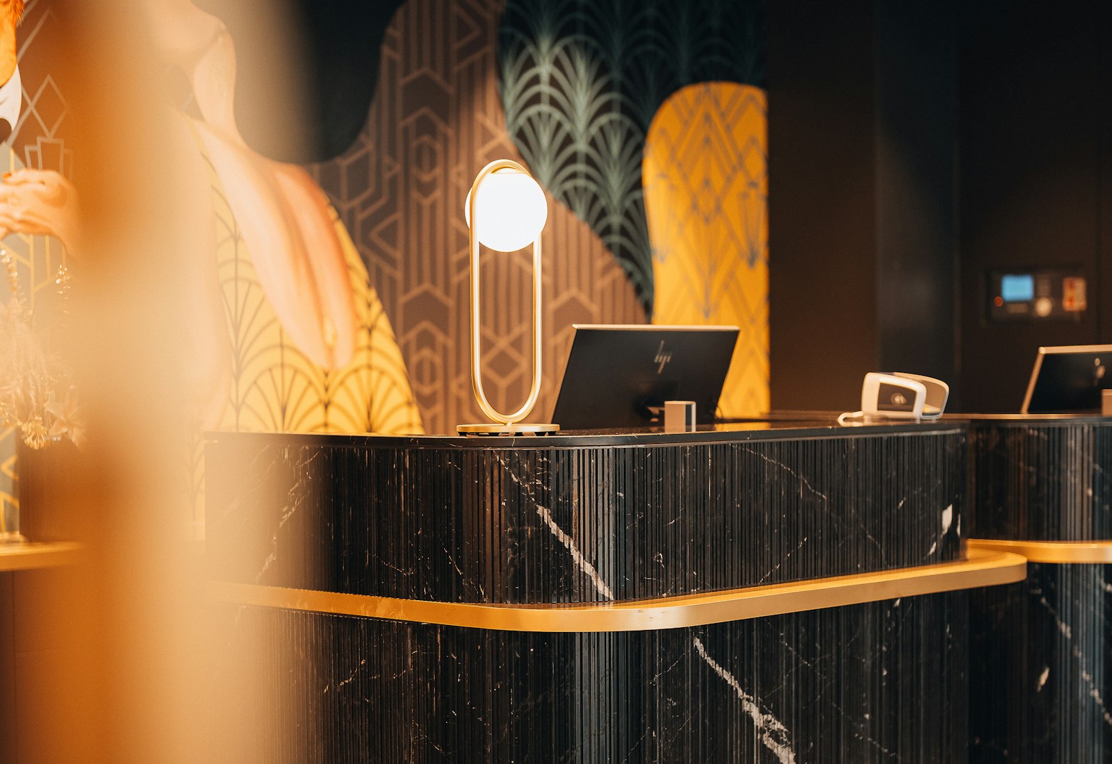 A guest connecting to guest Wi-Fi on a phone in a hotel lobby